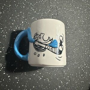White Mug with Blue Handle and Charlie Brown design